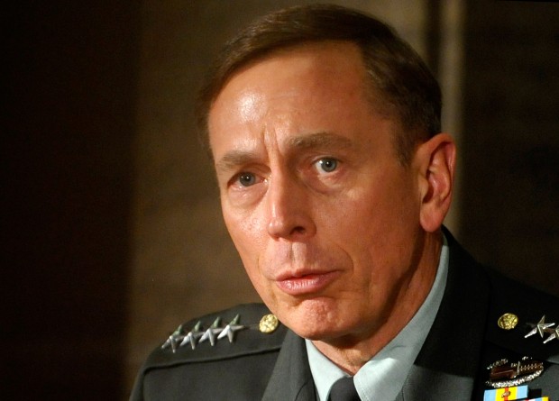 Initial positive coverage of the General David Petraeus's biography reflects many journalists’ willingness to suspend their critical faculties when it comes to the military. (AP/ Michael Gottschalk)
