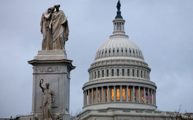 The Capitol Building in Washington, D.C., where the budget battles are taking place. Gay and transgender Americans could be negatively impacted if sequestration affects the many government programs that help them access health care, protect them from violence and bullying, and make higher education a reality, among others. (AP/J. Scott Applewhite)