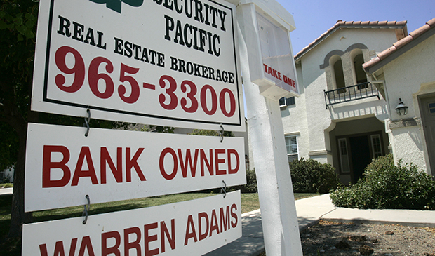 A bank-owned home is seen for sale in Sacramento, California, Wednesday, July 2, 2008. (AP/Rich Pedroncelli)