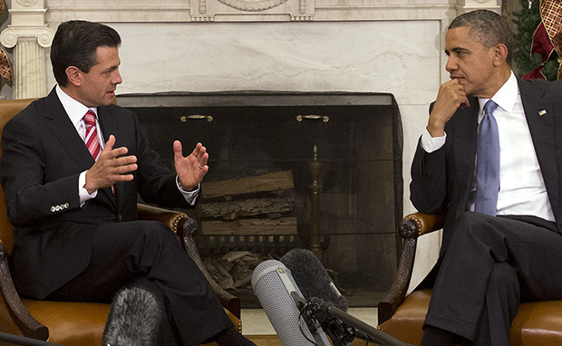 President Barack Obama listens as Mexican President-Elect Enrique Peña Nieto speaks prior to their meeting in the Oval Office of the White House in Washington, Tuesday, November 27, 2012. (AP/Jacquelyn Martin)