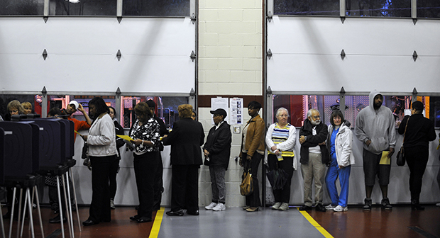 Voters wait in line to cast their ballots at the Mauldin Fire Station on Election Day, Tuesday, November 6, 2012, in Mauldin, South Carolina. (AP/Rainier Ehrhardt)