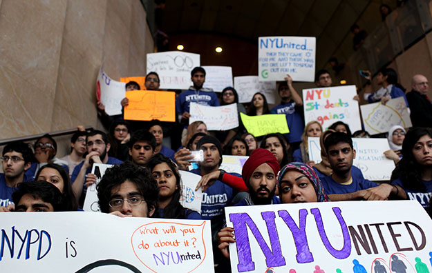 New York University students, faculty, and clergy gather at the Kimmel Center on the NYU campus to discuss the discovery of surveillance by the New York Police Department on Muslim communities. (AP/Craig Ruttle)