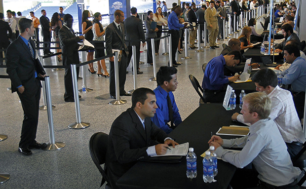 Job applicants are interviewed by Florida Marlins staff at Marlins Park in Miami, Wednesday, October 24, 2012. (AP/Alan Diaz)