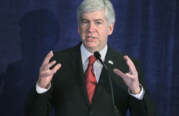 If Michigan Gov. Rick Snyder signs so-called right-to-work legislation, it will significantly hurt workers, the middle class, and the economy in general. (AP/Carlos Osorio)