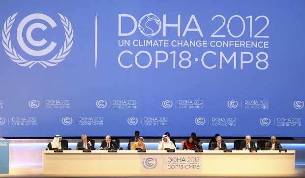 Organizers are seen on stage at the opening ceremony of the 18th U.N. climate change conference in Doha, Qatar, Monday, November 26, 2012. (AP/Osama Faisal)