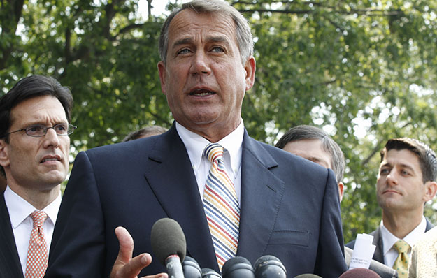 House Speaker John Boehner (R-OH), center, stands with, from left, House Majority Leader Eric Cantor (R-VA) and House Budget Committee Chairman Paul Ryan (R-WI) as he speaks to reporters outside the White House in Washington, Wednesday, June 1, 2011, after their meeting with President Barack Obama regarding the debt ceiling. (AP/Charles Dharapak)