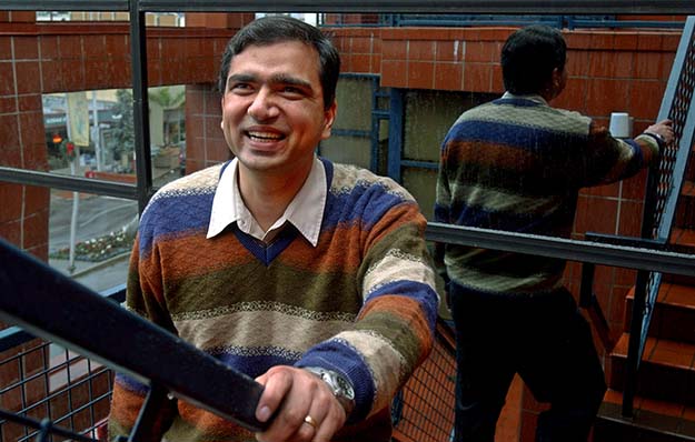 Rosen Sharma, president and CEO of BlueStacks, smiles at his former office in Palo Alto, California. In 2011 immigrant entrepreneurs were responsible for more than one in four new U.S. businesses, and immigrant businesses employ 1 in every 10 people working for private companies. (AP/Paul Sakuma)