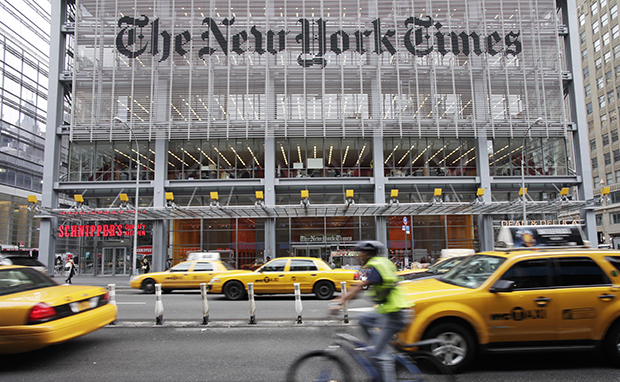 Traffic passes the New York Times building in New York, Tuesday, October 18, 2011. (AP/Mark Lennihan)