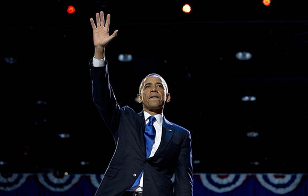 President Barack Obama waves to supporters at the election night party, Wednesday, November 7, 2012, in Chicago, to proclaim victory in the presidential election. (AP/Carolyn Kaster)