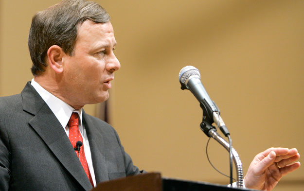 Supreme Court Chief Justice John Roberts speaks to students and faculty at the Northwestern University School of Law in 2007. Justice Roberts in 2011 ruled that matching funds, which even the score between publicly and privately financed campaigns, violated the First Amendment rights of privately funded candidates. (AP/M. Spencer Green)
