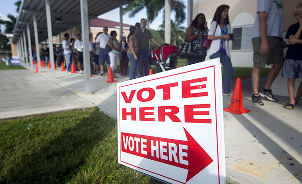 People stand in line to vote early on Sunday, October 28, 2012, in Pembroke Pines, Florida. (AP/J Pat Carter)