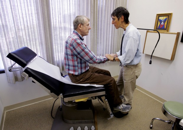 Physicians should more widely use shared decision making, which will benefit physicians and patients alike. (AP/Paul Sakuma)