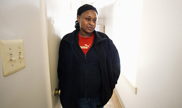 In this photo taken Friday, March 9, 2012, homeless veteran Misha McLamb, 32, talks in her transition home in the Adams Morgan neighborhood of Washington. (AP/Manuel Balce Ceneta)