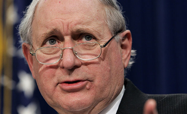 A special rule in the tax code lets certain derivatives traders pay a “blended” rate on their income. Investors must generally hold onto assets for one year in order to enjoy low-rate, capital gains treatment, but traders who buy and sell derivatives are eligible for the blended rate even if they buy and sell instantly. Sen. Carl Levin (D-MI), above, introduced legislation in the last Congress to close this loophole. (AP/Susan Walsh)