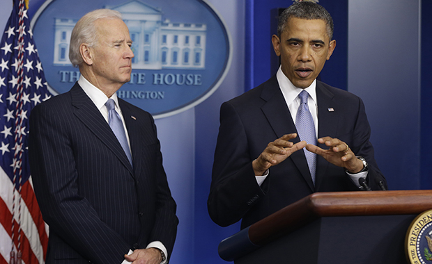 President Barack Obama and Vice President Joe Biden make a statement regarding the passage of the fiscal cliff bill in the Brady Press Briefing Room at the White House in Washington, Tuesday, January 1, 2013. (AP/Charles Dharapak)