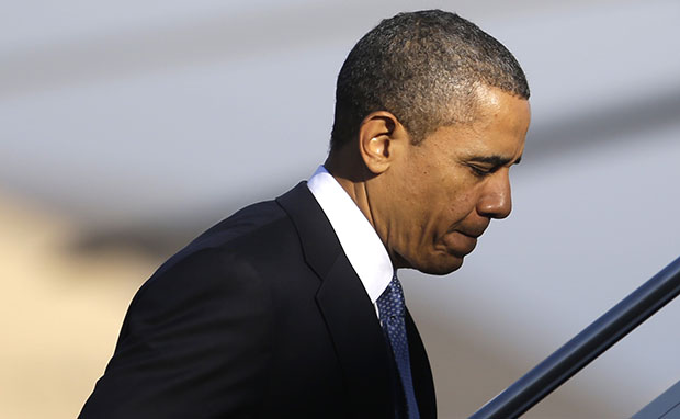 El presidente Barack Obama montandose en Air Force One, Martes, 29 de enero 2013, en la Base Aérea de Andrews, Maryland, en camino a Las Vegas para dar su discurso sobre inmigración.