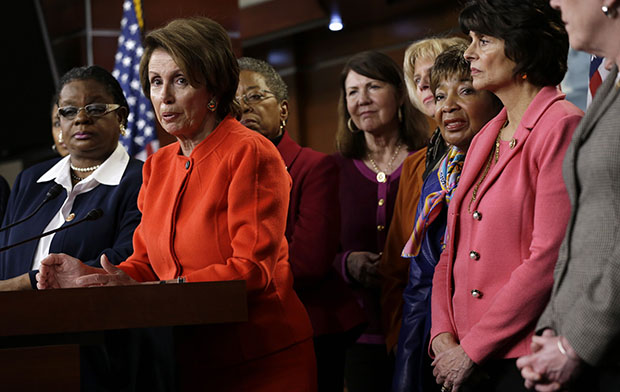 House Minority Leader Nancy Pelosi (D-CA), center, accompanied by fellow House Democrats, leads a news conference on Capitol Hill in Washington, Wednesday, January 23, 2013, to discuss the reintroduction of the Violence Against Women Act. (AP/Jacquelyn Martin)