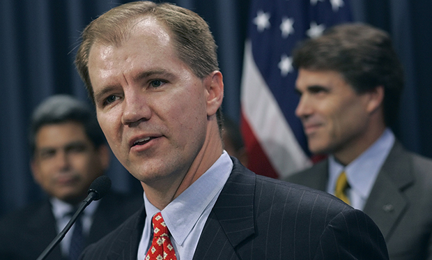 Don Willett, foreground, speaks after Texas Gov. Rick Perry (R), right, announced that Willett was named to the Texas Supreme Court on Wednesday, August 24, 2005, in Austin, Texas. (AP/Harry Cabluck)