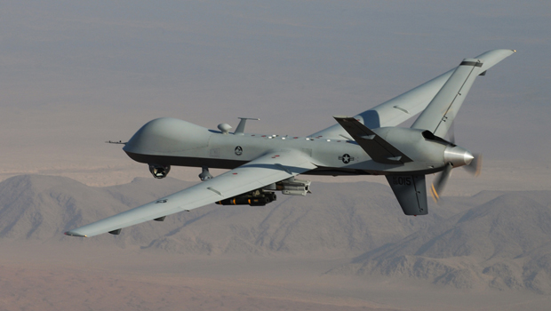 A U.S. Air Force MQ-9 Reaper flies over southern Afghanistan during a combat mission. (AP/Lt. Col. Leslie Pratt)