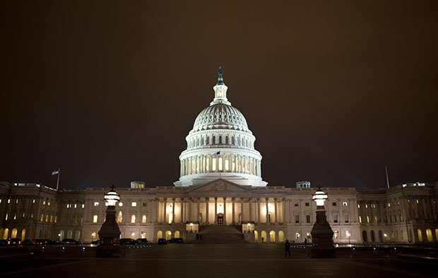 The lights of the U.S. Capitol remain lit into the night on Tuesday, January 1, 2013. (AP/Jacquelyn Martin)