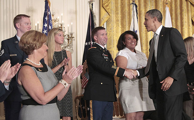 President Barack Obama greets members of the military and their family members in the East Room of the White House on Tuesday, April 12, 2011, after the launch of Joining Forces, the national initiative to support and honor America's service members and their families. (AP/Pablo Martinez Monsivais)