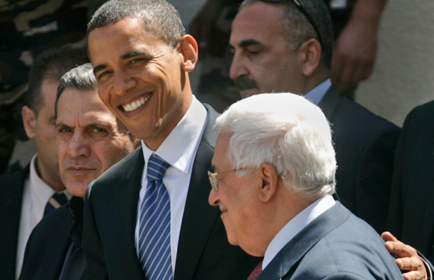 Then-U.S. Democratic presidential candidate Sen. Barack Obama (D-IL), left, walks with Palestinian President Mahmoud Abbas, right, as he leaves following a meeting at Abbas' headquarters in the West Bank town of Ramallah, July 23, 2008. (AP/Muhammed Muheisen)