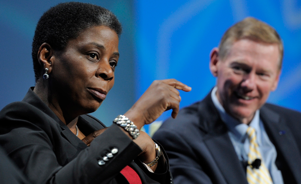Ursula Burns, chairman and chief executive officer of Xerox, talks as Alan Mulally, president and chief executive officer of the Ford Motor Company looks on during a panel discussion at the 2012 International CES in Las Vegas, January 11, 2012. Burns is the first African American woman CEO to run a Fortune 500 company. (AP/Jack Dempsey)