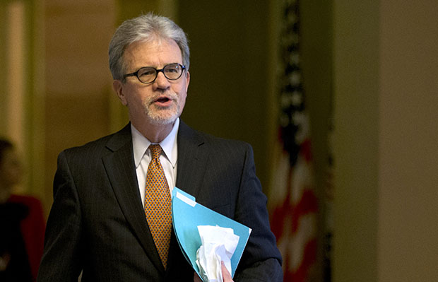 Sen. Tom Coburn (R-OK) walks toward the Senate chamber on Capitol Hill in Washington, December 31, 2012. (AP/Jacquelyn Martin)