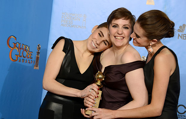 Zosia Mamet, left, Lena Dunham, center, and Allison Williams pose with the award for best television series – comedy or musical for 