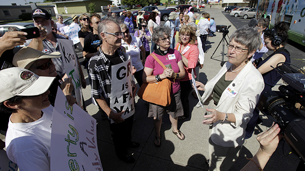 Sister Simone Campbell, right, speaks to supporters during a stop on the first day of the 