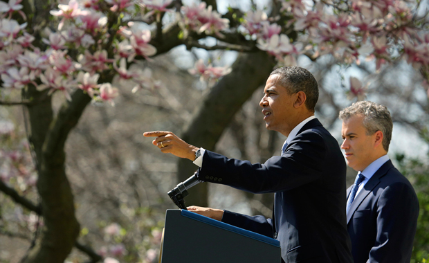 President Barack Obama, accompanied by acting Budget Director Jeffrey Zients, speaks in the Rose Garden of the White House in Washington, Wednesday, April 10, 2013, to discuss his proposed fiscal year 2014 federal budget. (AP/J. David Ake)
