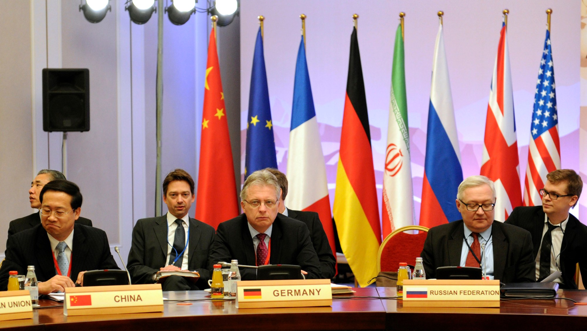 Representative from China, Germany and Russia listen during talks on Iran's nuclear program in Almaty, Kazakhstan. World powers hope Iran will respond positively on Wednesday to their new offer to lift some sanctions if Tehran scales back nuclear activity the West fears could be used to build bombs (AP/ Ilyas Omarov)