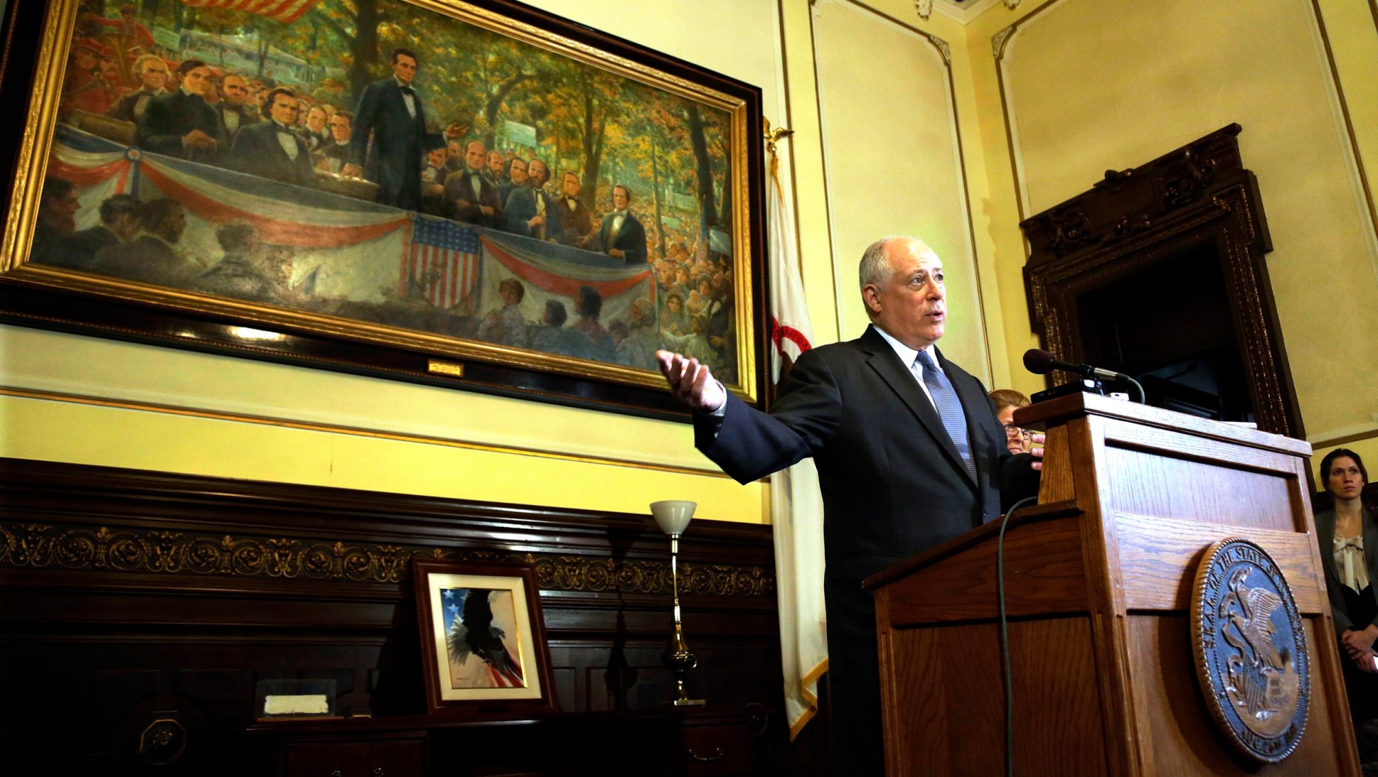 Gov. Pat Quinn (D-Il) speaks to reporters in his office at the Illinois State Capitol. In the fiscal year 2014 budget, Gov. Quinn outlined plans for Illinois to become the second state to launch a Social Impact Bond program. (AP/ Seth Perlman)