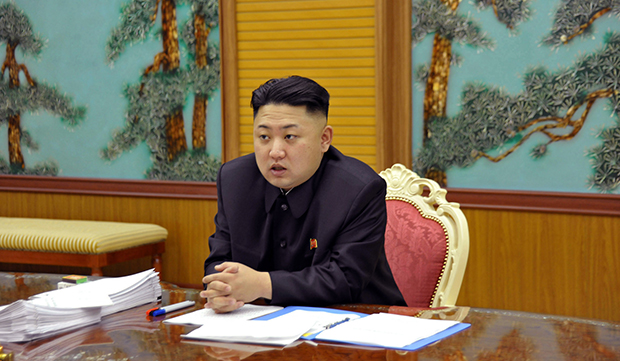 In this undated photo released by the Korean Central News Agency and distributed Sunday, January 27, 2013, in Tokyo by the Korea News Service, North Korean leader Kim Jong-un attends a consultative meeting with officials in the fields of state security and foreign affairs at an undisclosed location in North Korea. (AP/Korean Central News Agency via Korea News Service)