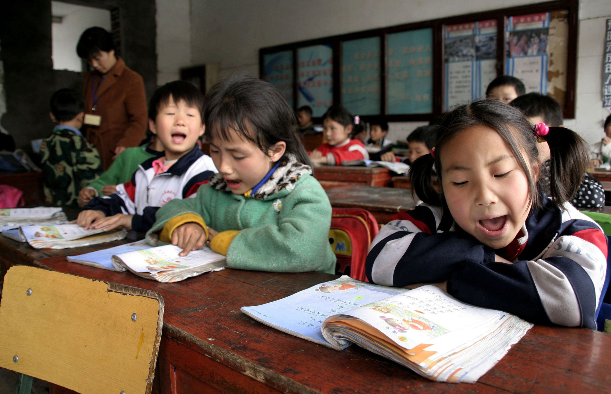 Students learn Chinese language at Fusheng Migrant School in Shanghai, China. (AP/Eugene Hoshiko)
