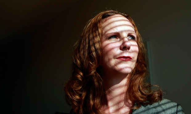 Carolyn Schapper poses in her home in Washington, D.C., July 3, 2008. Schapper was harassed in Iraq by a fellow Army National Guard soldier. (AP/Pablo Martinez Monsivais)