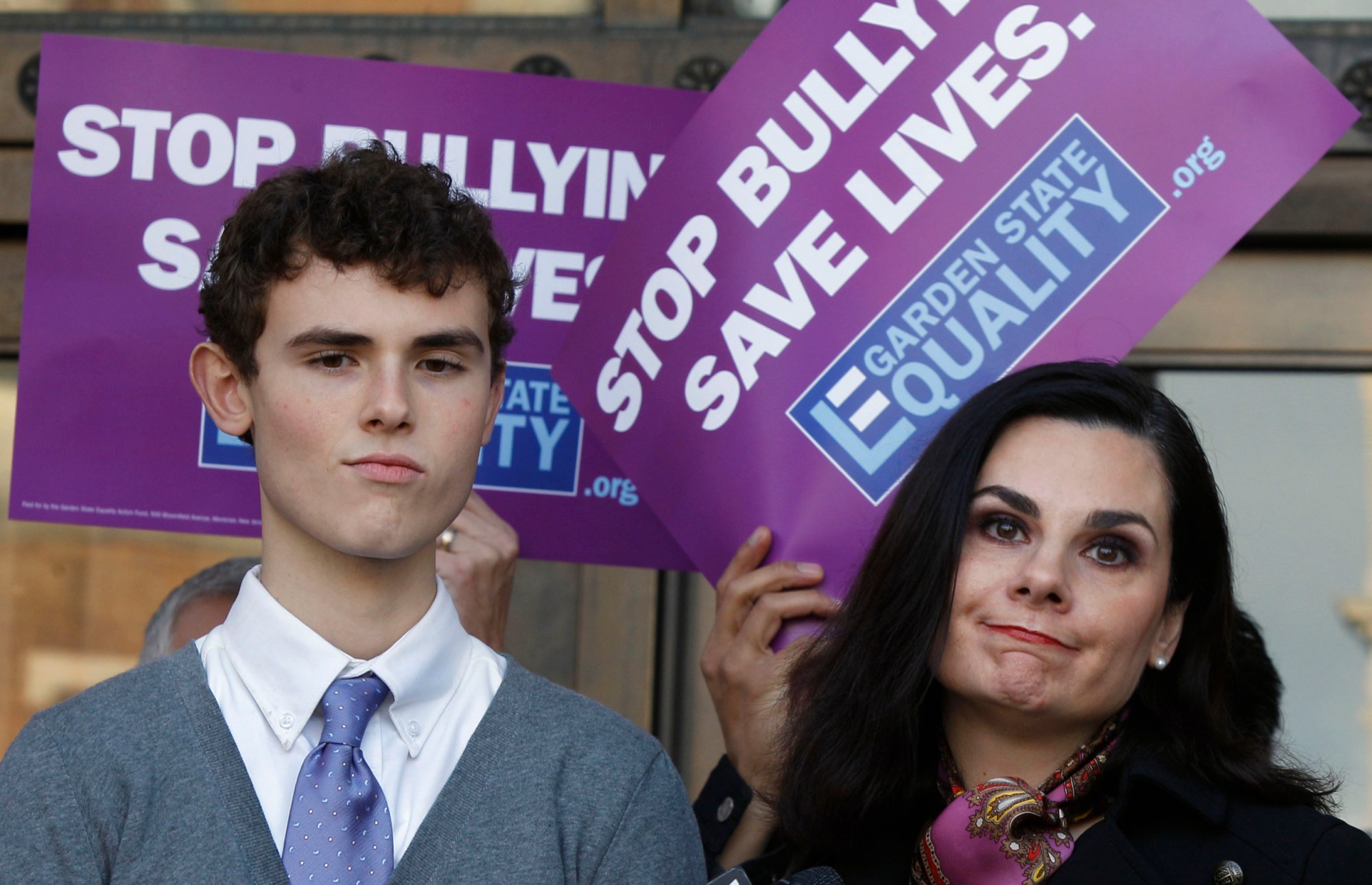 A high school student and his mother listen to a question about his suffering through bullying at Haddonfield Memorial High School in Haddonfield, New Jersey. (AP/  	Mel Evans)