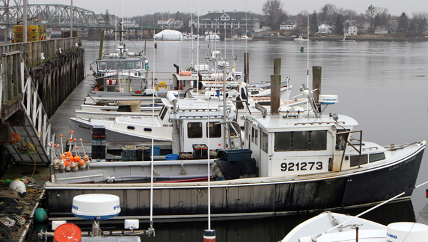 Fishing boats are seen at the commercial fishing pier, Wednesday, February 1, 2012, in Portsmouth, New Hampshire. (AP/Jim Cole)