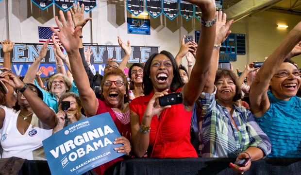 Audience members cheer as President Barack Obama holds a campaign rally at Centreville High School in Clifton, Virginia, on Saturday, July 14, 2012. (AP/J. Scott Applewhite)