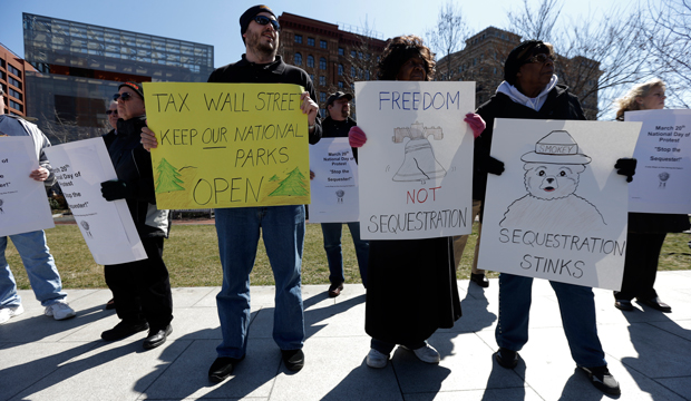 Government workers, supporting union members, and activists protest against the across-the-board spending cuts called sequestration at Independence National Historical Park on Wednesday, March 20, 2013, in Philadelphia, Pennsylvania. (AP/Matt Rourke)