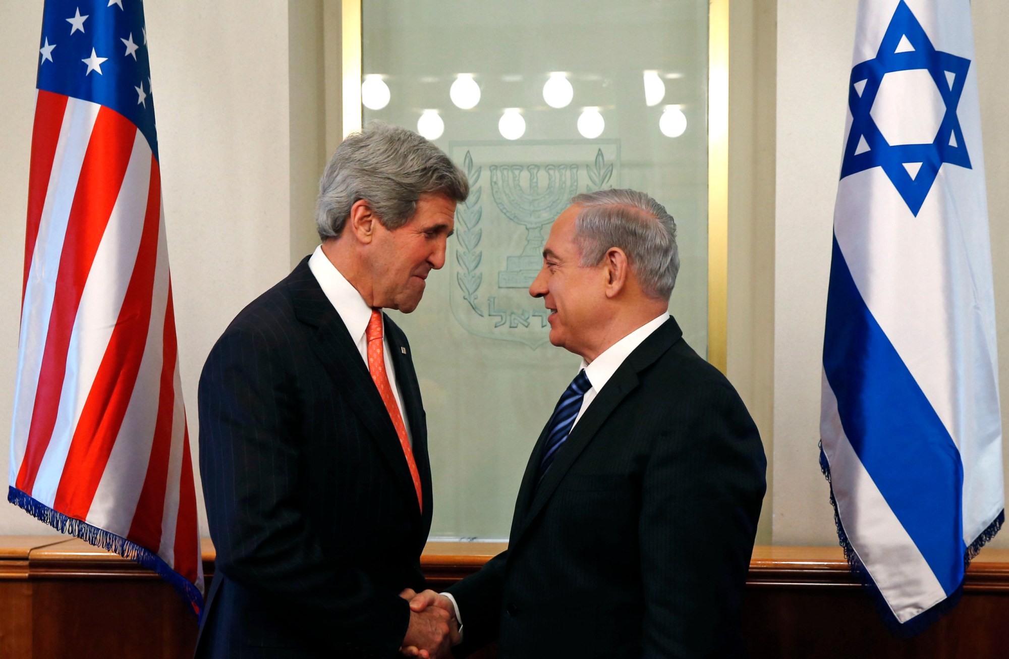 U.S. Secretary of State John Kerry meets with Israeli Prime Minster Benjamin Netanyahu in Jerusalem to discuss a restart of the Middle East peace process after more than four years of hardly any talks. (AP/Jim Young)