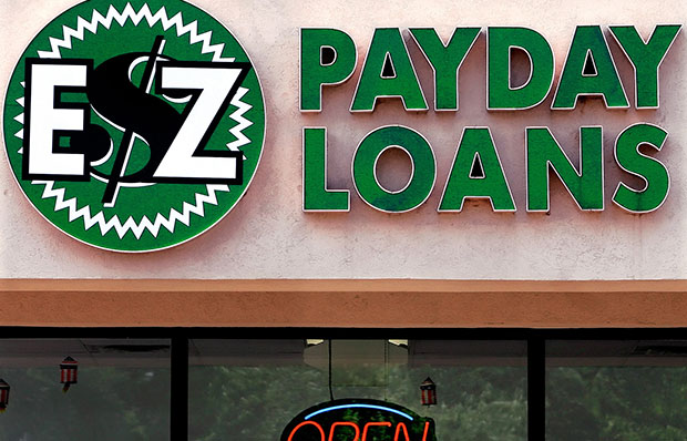 The Payday Loans store in Springfield, Illinois, is shown open for business in June 2006. (AP/Seth Perlman)