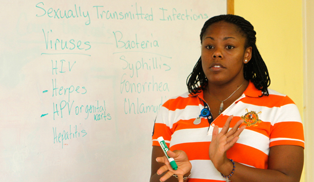 In this photo taken Sept. 10, 2010, sex-education teacher Shayna Knowles gestures during class. (AP/Alan Diaz)