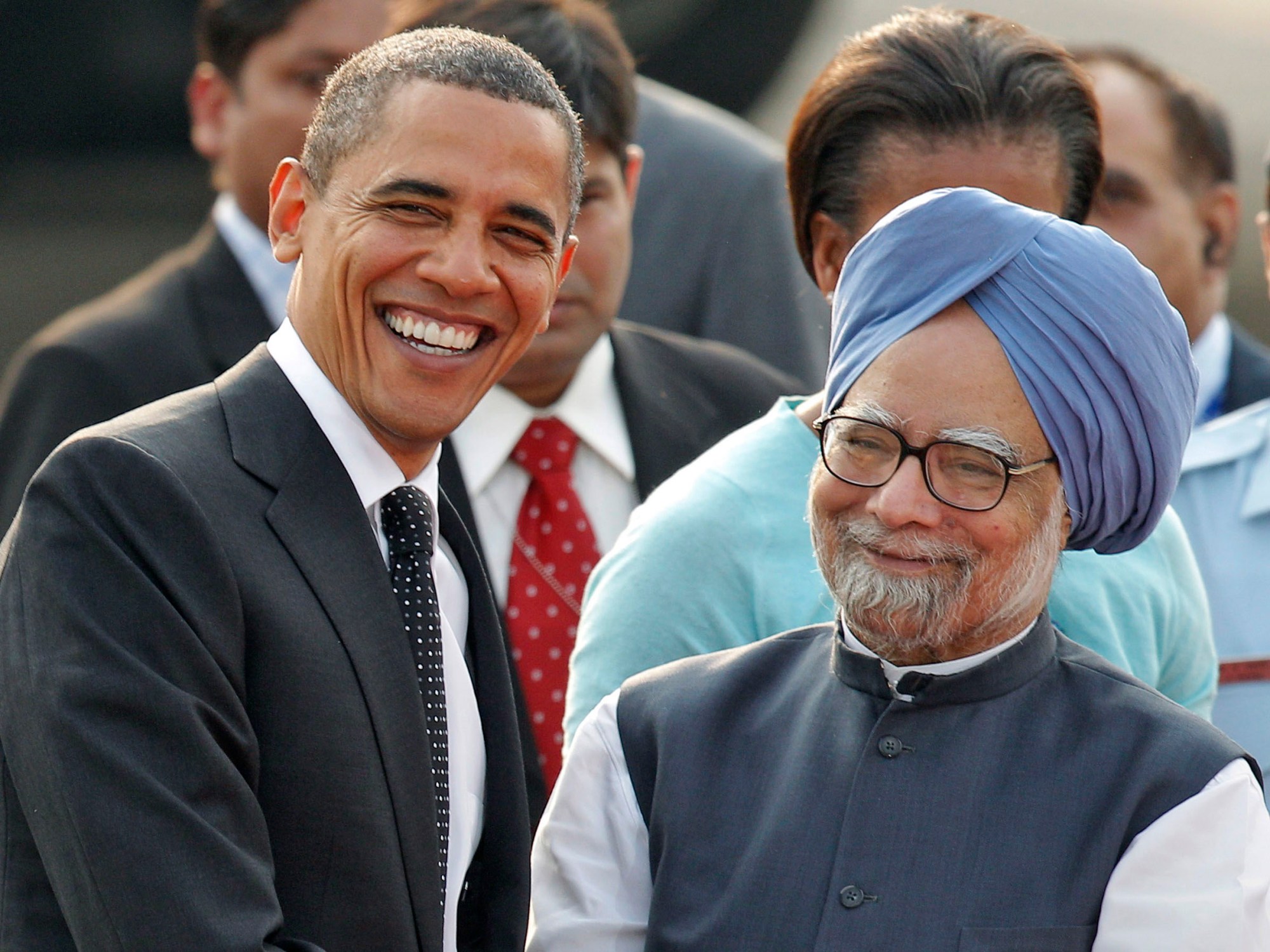 President Barack Obama is greeted by Indian Prime Minister Manmohan Singh at the airport in New Delhi, India. (AP/Gurinder Osan)