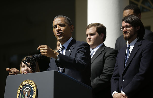 President Barack Obama, joined by college students, speaks in the Rose Garden of the White House in Washington, Friday, May 31, 2013, where he called on Congress to keep federally subsidized student-loan rates from doubling on July 1. (AP/Pablo Martinez Monsivais)
