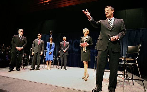 Debate moderators Joe Scarborough, right, and Mika Brzezinski, second from right, co-hosts of MSNBC's 
