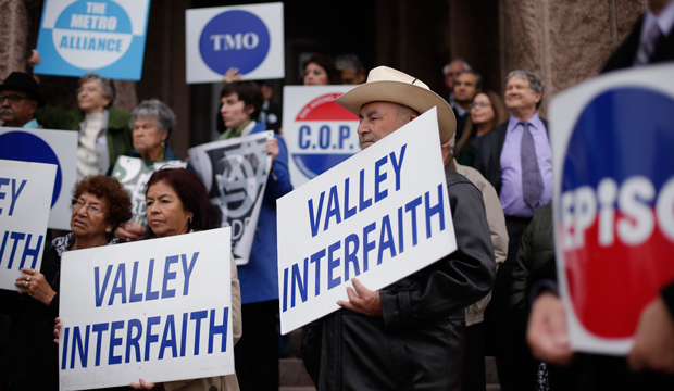 Interfaith clergy, leaders, supporters, and county officials gather on the steps of the Texas state capitol for a rally in support of Medicaid expansion, Wednesday, February 20, 2013 in Austin, Texas. (AP/Eric Gay)