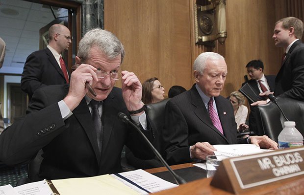 Senate Finance Committee Chairman Sen. Max Baucus (D-MT), left, and Ranking Member Sen. Orrin Hatch (R-UT), right, open a hearing on Capitol Hill in Washington, May 12, 2011. Congress has an opportunity to strengthen the middle class and encourage economic growth through tax reform. (AP/J. Scott Applewhite)