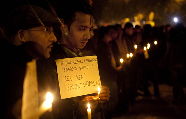 Indians participate in a candle-lit vigil to mourn the death of a gang rape victim in New Delhi, India, Sunday, December 30, 2012. (AP/Dar Yasin)