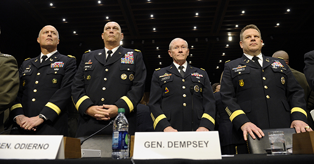 From left, Judge Advocate General of the Army Lt. Gen. Dana Chipman; Army Chief of Staff Gen. Ray Odierno; Joint Chiefs Chairman Gen. Martin Dempsey; and Legal Counsel to the Chairman of the Joint Chiefs of Staff Brig. Gen. Richard Gross, arrive on Capitol Hill in Washington, Tuesday, June 4, 2013, to testify before the Senate Armed Services Committee hearing on pending legislation regarding sexual assaults in the military. (AP/Susan Walsh)
